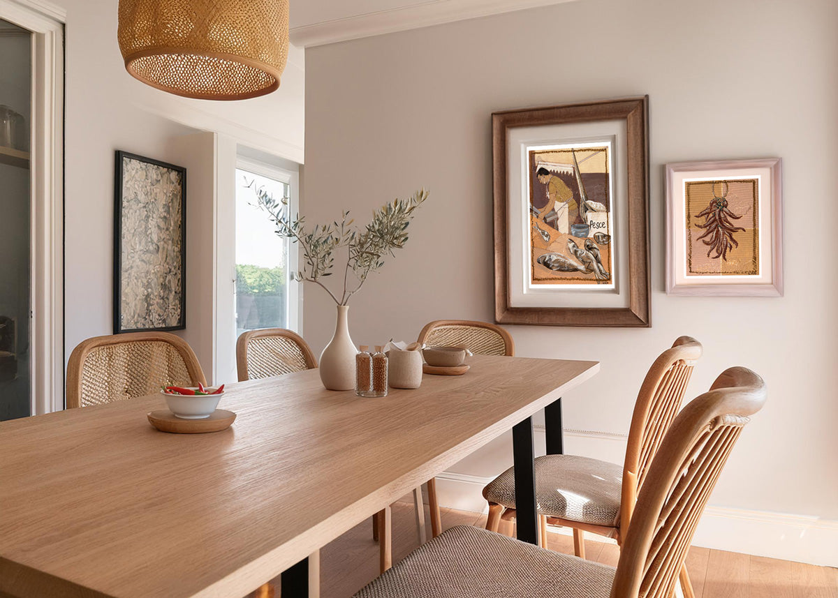 seafood market and chillies framed prints by marissa lico. Dining room with wooden table and chairs, framed print on the wall.