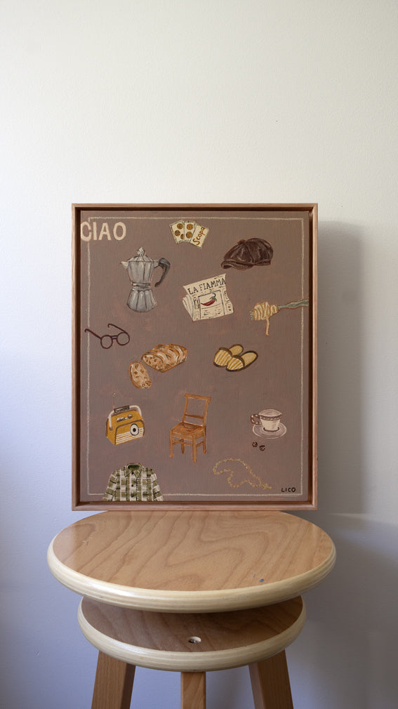 Ciao Nonno original framed painting of grandfather things by Marissa Lico. Framed artwork with illustrations and text on a wooden stool against a white wall