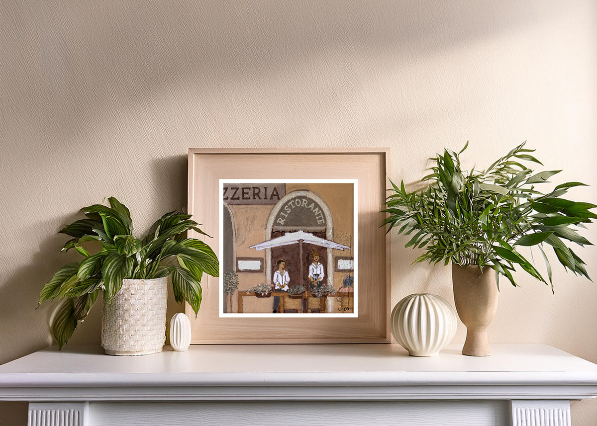 Pizzeria fine art print by marissa lico, Framed print of a restaurant exterior on a shelf with plants