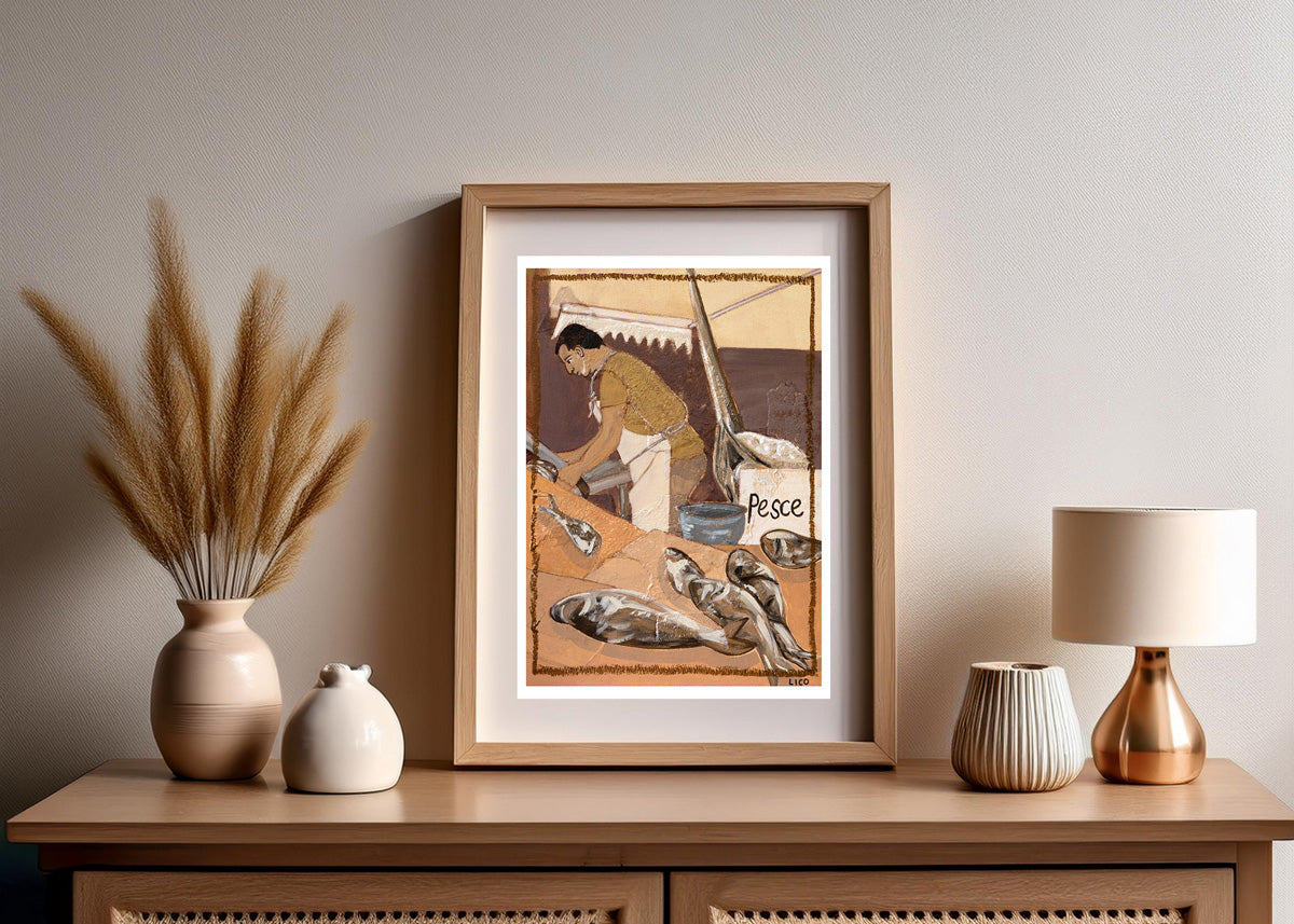 seafood market framed fine art print by marissa lico. Framed artwork on a wooden side table with decorative items.