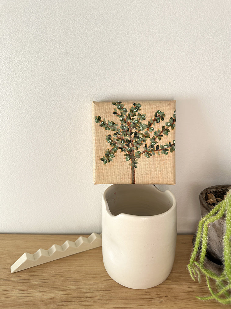 Ulivo original painting of olive tree by Marissa Lico. Miniature Painting sitting in artists studio.