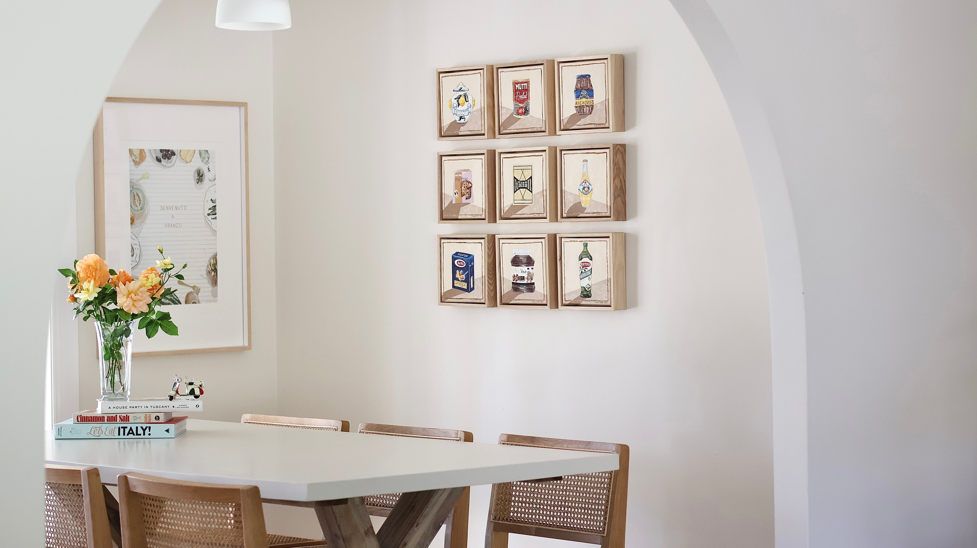 Lo Shop series of works by Marissa Lico in a modern dining room with framed artworks