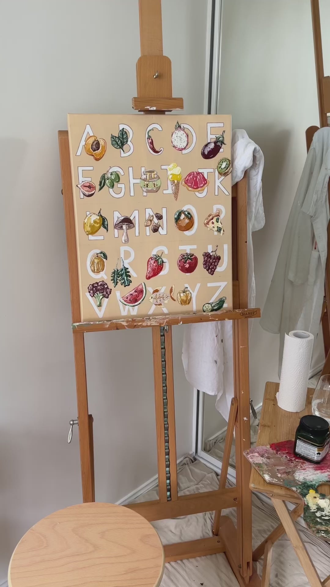 Alfabeto by Marissa Lico during the painting process in the artist studio.