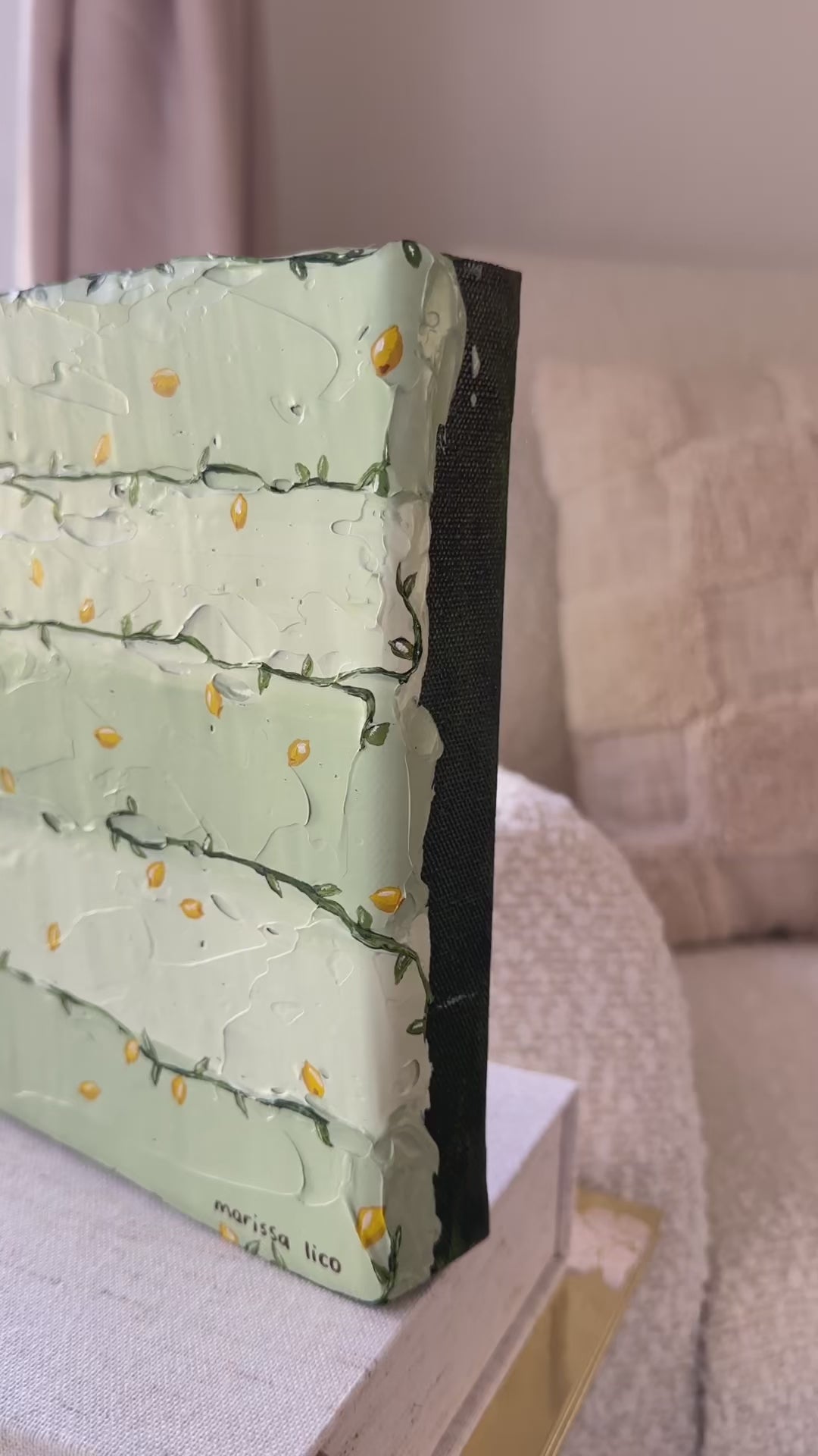 Tanto Limone by Marissa Lico, video of original painting sitting on books in nursery.