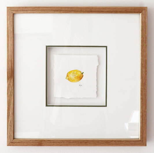 Watercolour painting of a lemon from Italy, framed in Oak, by artist Marissa Lico.