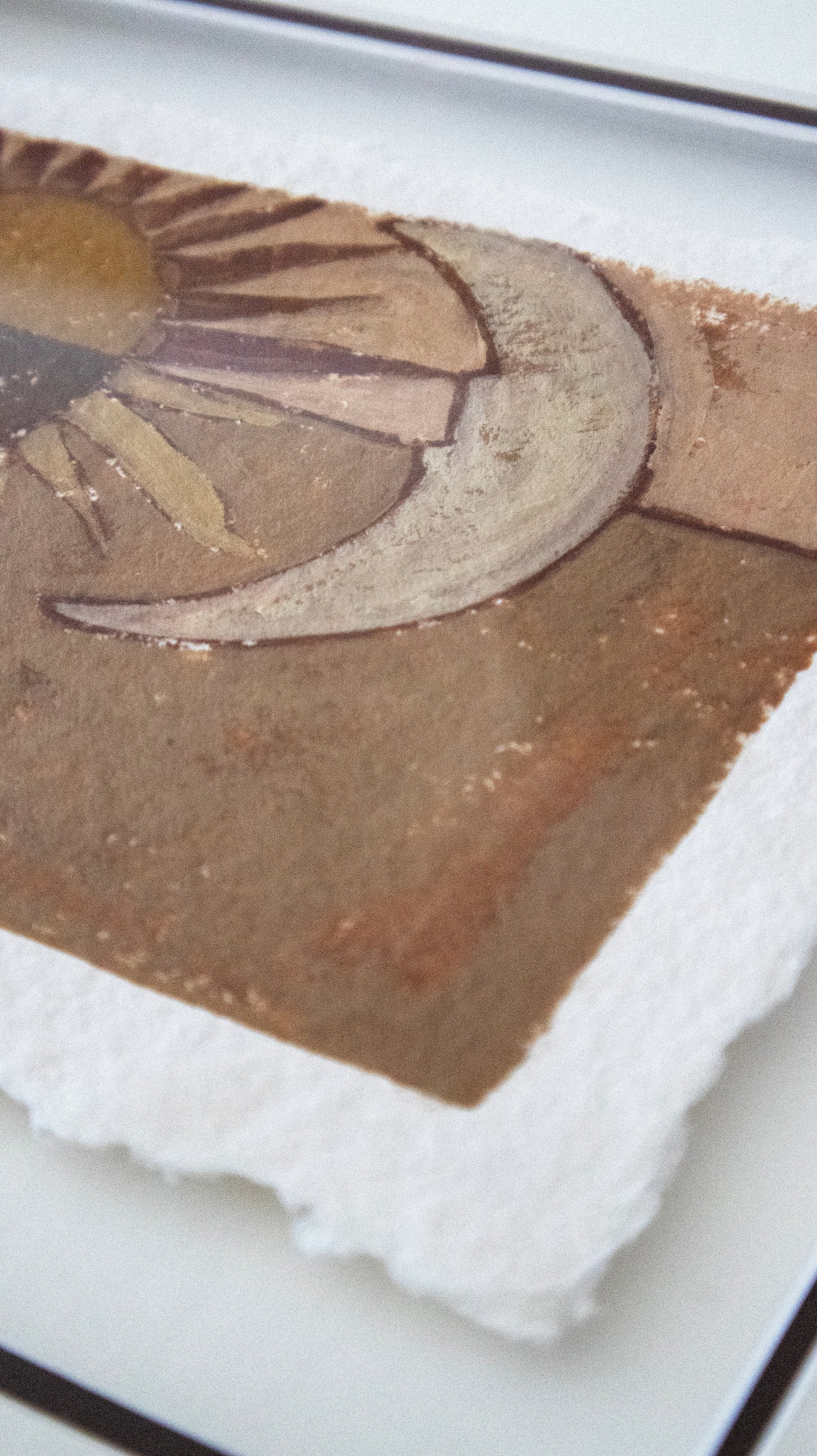 A close-up of a textured original painting featuring a crescent moon and sun design in earthy brown, beige, and tan tones, layered over a white textured background.