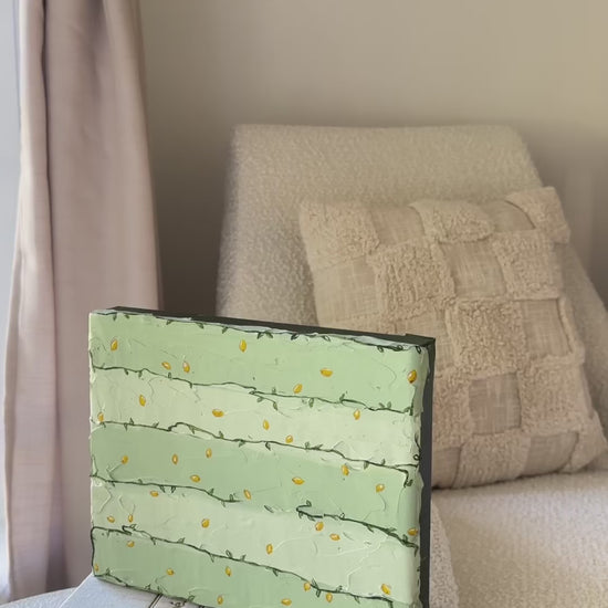 Tanto Limone by Marissa Lico, video of original painting sitting on books in little girl's nursery.