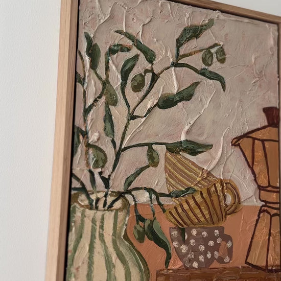Video showing details of Scusi Coffee original textured still life painting with olive branches and coffee vessels by Marissa Lico"
