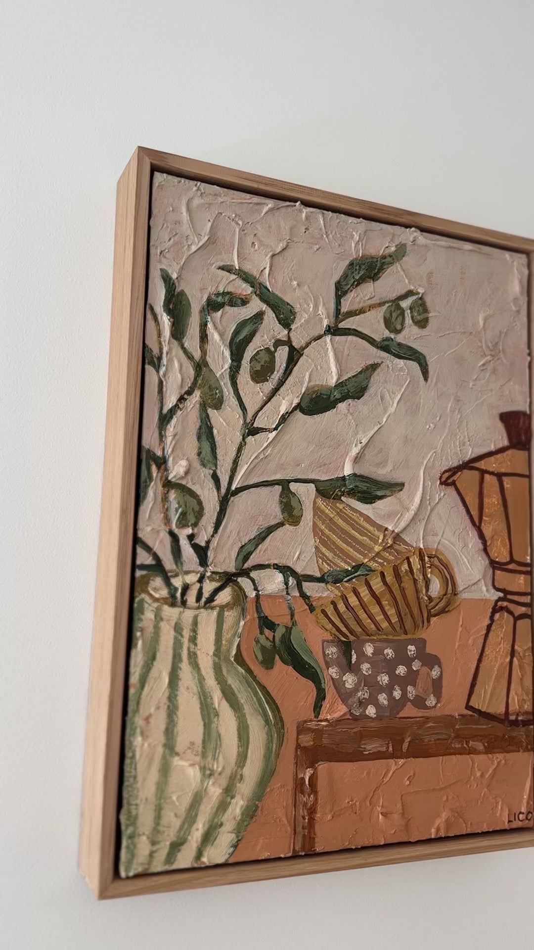 Video showing details of Scusi Coffee original textured still life painting with olive branches and coffee vessels by Marissa Lico"