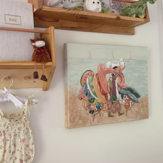 Beach Games original painting by Marissa Lico, displayed in a baby's nursery among books and toys.